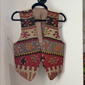 The Nomaoic Collection wool patterned vest. I accidentally ripped the label off.